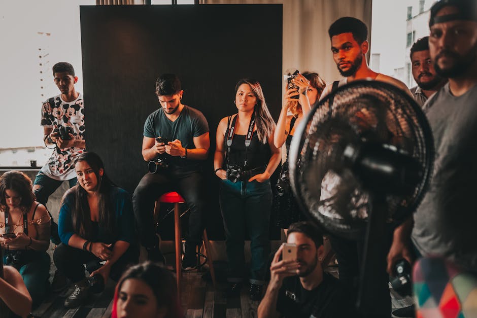 A group of diverse event photographers in Albuquerque with their professional camera equipment