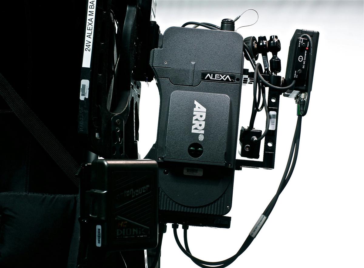 A high-end Arri Alexa digital cinema camera, known for its exceptional image quality and versatility, showcased in a film studio setting, ready for a professional production.