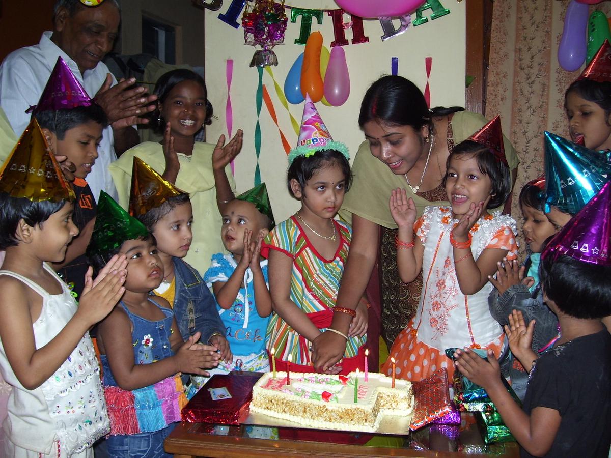 A collection of candid and posed photographs from a birthday party celebration, showcasing joyful moments and colorful details.