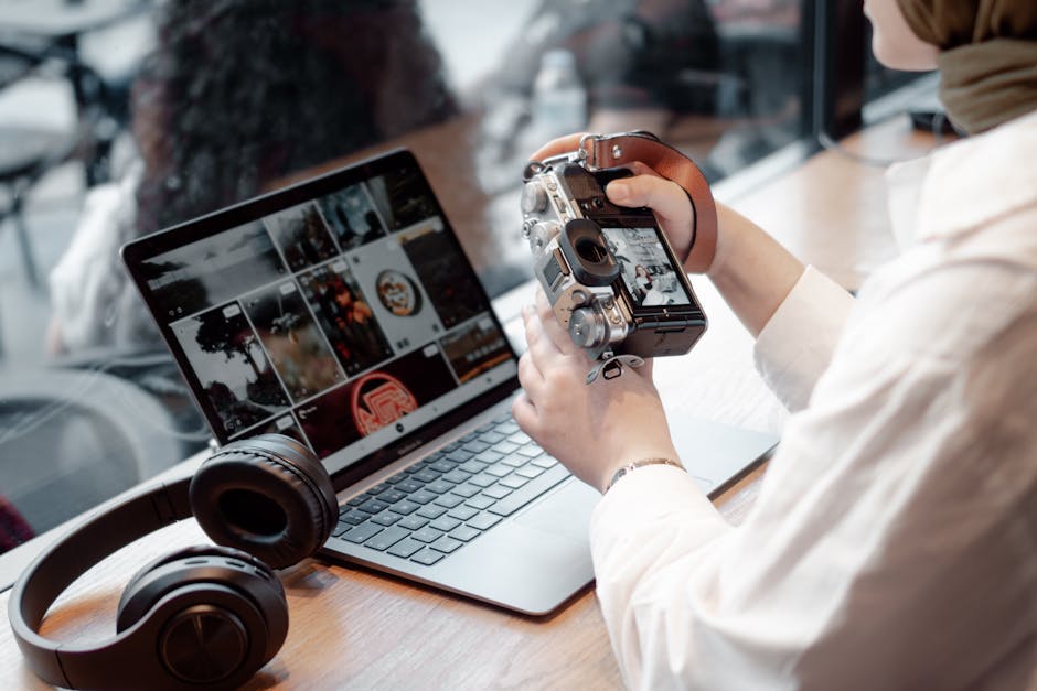 A commercial photographer in Springdale reviewing and editing photos on a computer, showcasing the storytelling aspect of their work