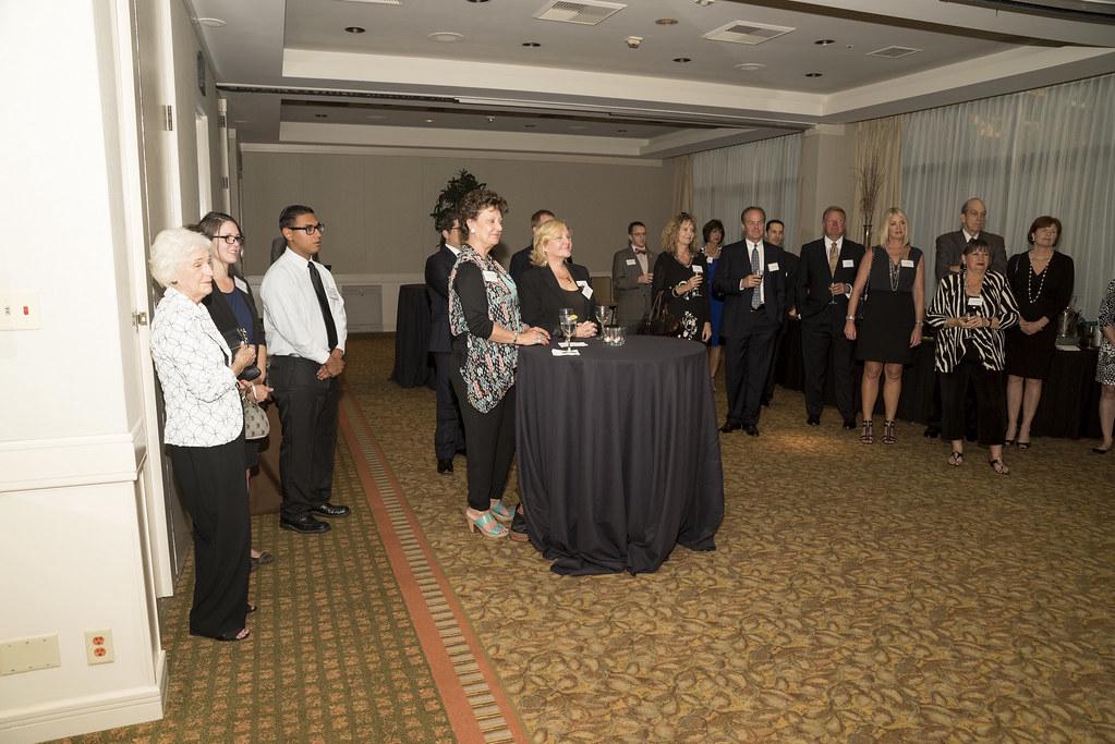A corporate office displaying professional event photos from a recent conference