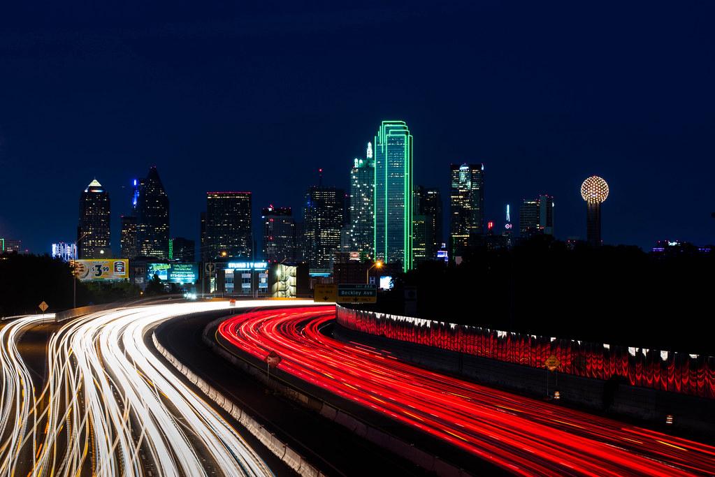 The iconic Dallas skyline at night, representing the vibrant event scene in the city
