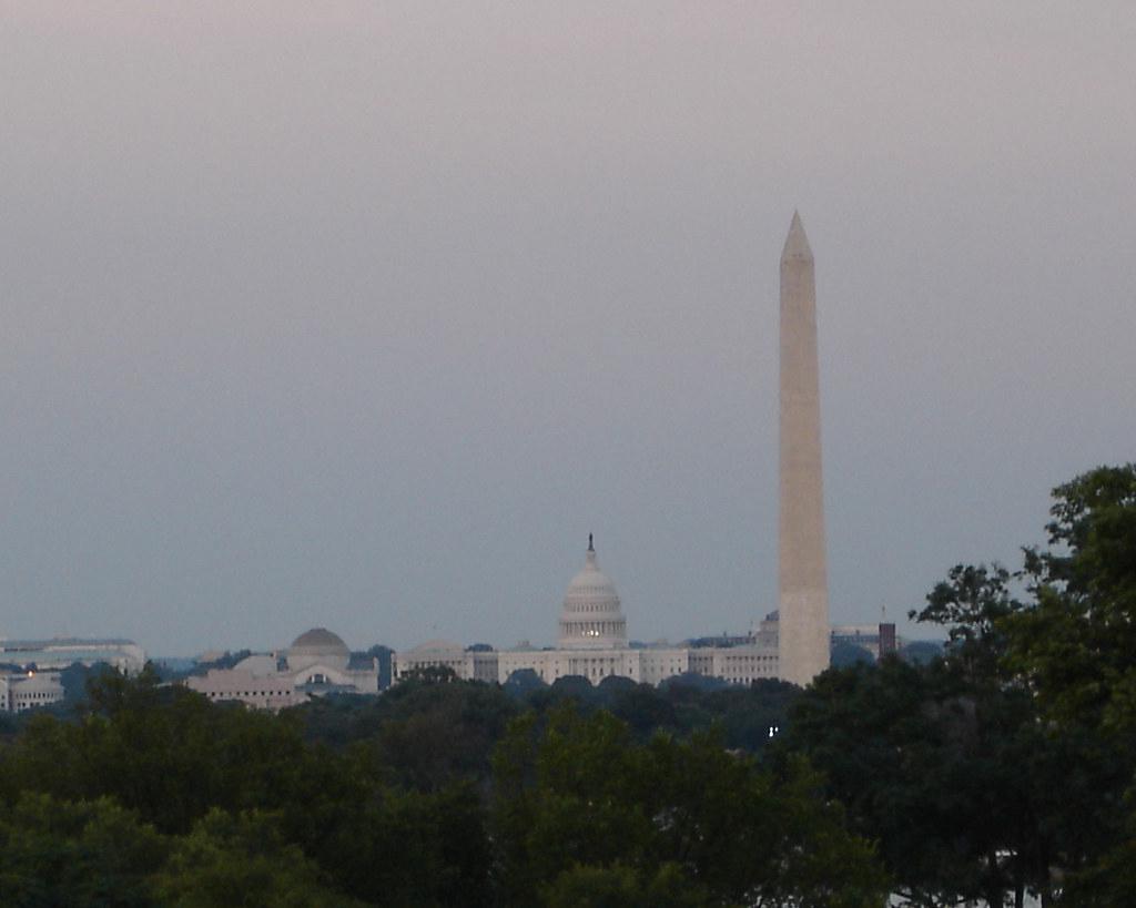 Washington DC skyline at twilight with iconic landmarks illuminated