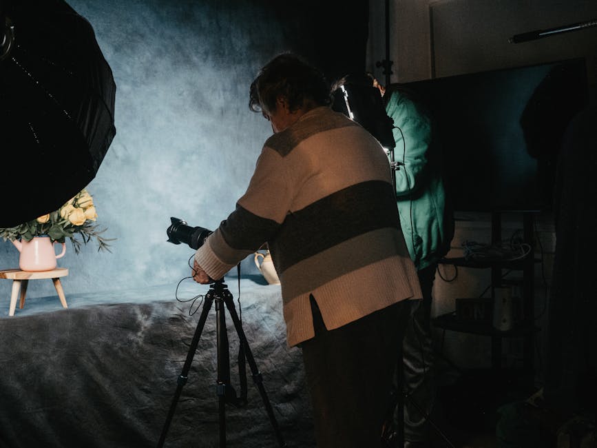 A photographer demonstrating advanced lighting and composition techniques at an event