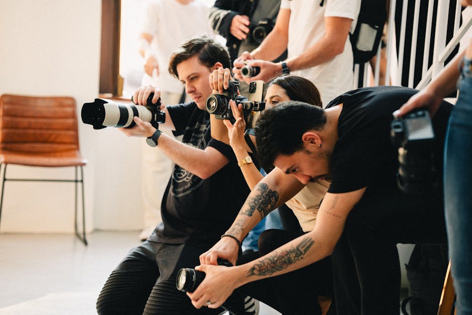 A Nashville event professional seamlessly switching between photography and videography roles