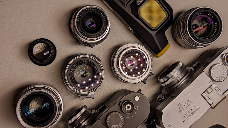 A comprehensive display of professional event photography equipment including cameras, lenses, and lighting gear