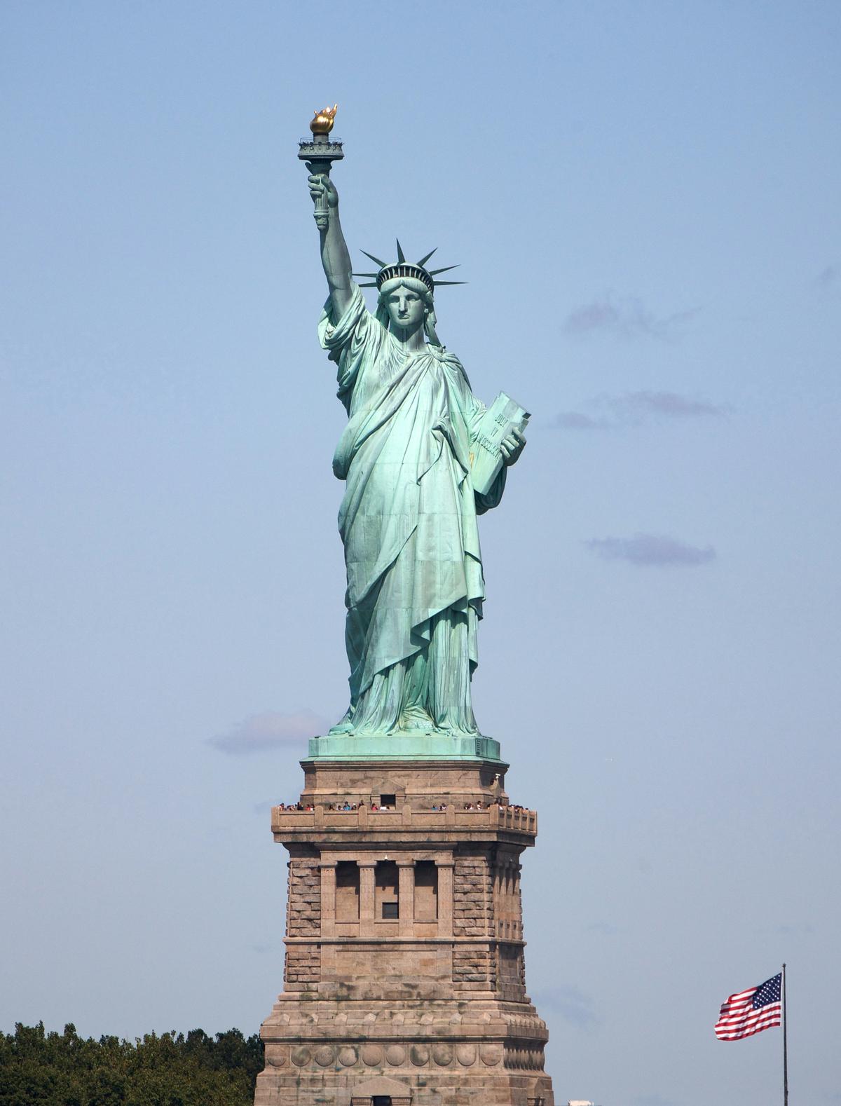 A collage showcasing various iconic locations in Jersey City, including the Statue of Liberty, the Central Railroad Terminal, Exchange Place, and more.