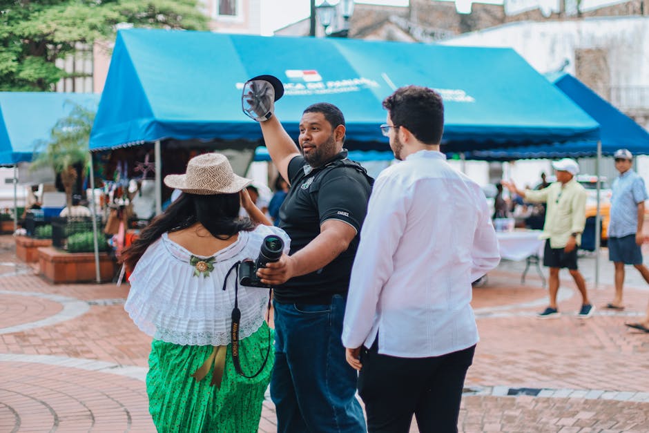 A skilled event photographer capturing a candid moment of attendee interaction, exemplifying the key elements of effective event photography: candidness, professionalism, technical expertise, and storytelling.