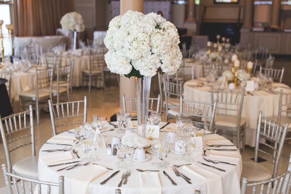 Interior of the Melonlight Ballroom set up for a wedding reception, with elegant table settings and soft lighting