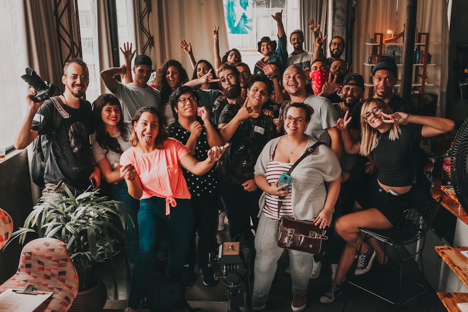Photographer networking with event organizers and attendees at a community gathering