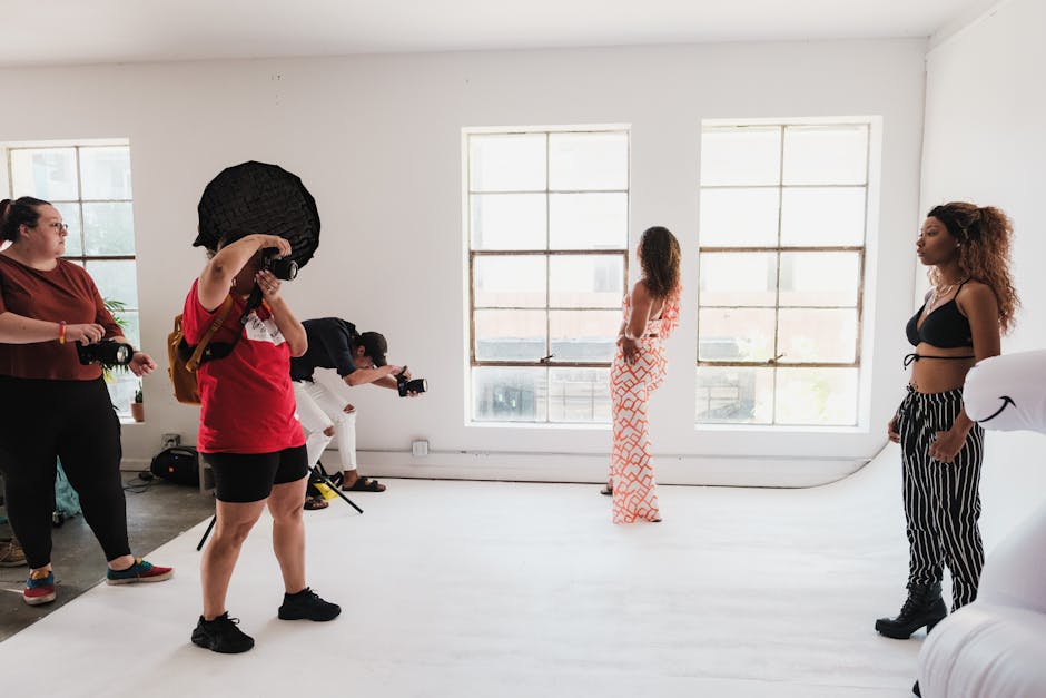 A group of diverse Portland event photographers with their equipment, showcasing their unique styles