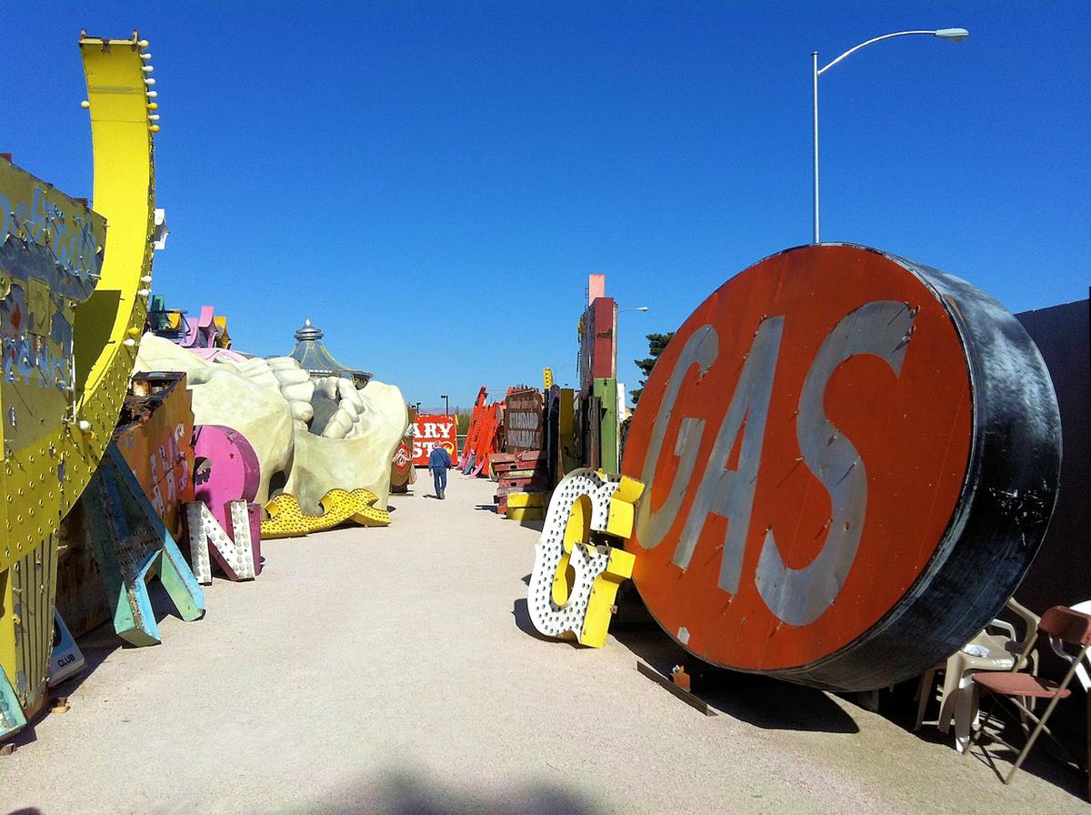 A montage of unique and visually striking photography locations in Las Vegas, including the Neon Museum, Fremont Street, and the Hoover Dam, showcasing the diverse range of backdrops and themes available for photoshoots in the city.