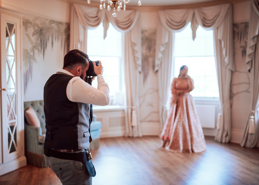 A wedding photographer capturing an emotional moment during a ceremony in Albuquerque